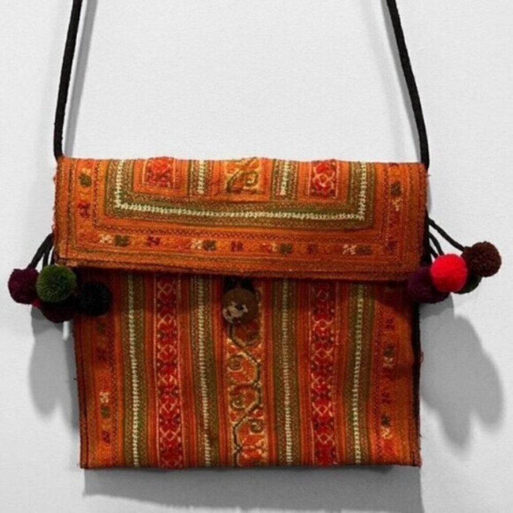Canvas bohemian crossbody bag with decorative Pompoms
